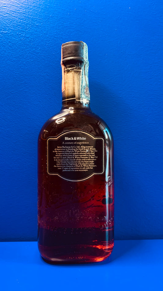 BLACK AND WHITE 12 YEARS OLD PREMIUM SCOTCH WHISKY